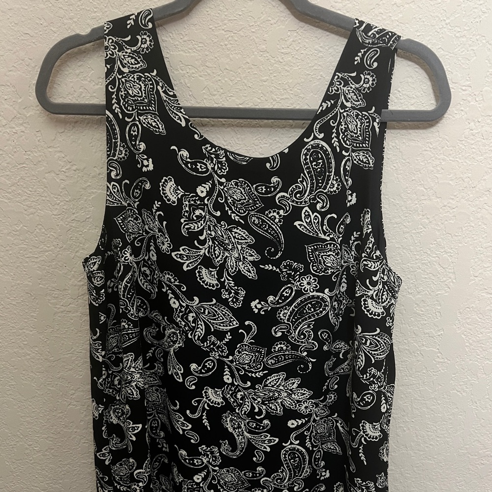 Black mini dress with a cream design